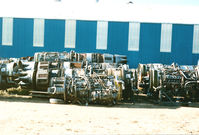 Mojave Airport (MHV) - A pile o' GE CJ805 turbojet engines removed from the Convair 880 jetliners stored for so many years at MHV. Many were meant for Torco Oil Comp., Chicago, for use on offshore rigs to generate electricity while burning natural gas. - by GatewayN727