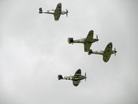RAF Fairford Airport, Fairford, England United Kingdom (EGVA) - Me109 D-FWME, Hurricane R4118 and Spits P7350 and PL344 in Formation at RIAT 2010 - by Manxman
