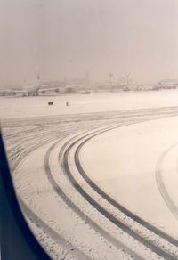 Narita International Airport (New Tokyo), Narita, Chiba Japan (RJAA) - Early morning snow at NRT , 01 Feb '90 - by Henk Geerlings