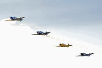 Centennial Airport (APA) - Stacked overflight, notice the way the digitals sensor  shows the light sensitivity in the blue sky to white cloud transition - by John Little