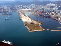 Kai Tak Airport (closed 1998), Kowloon Hong Kong (VHHX) - View from 1500ft entering the Harbour on Hong Kong Flying club C182 - by A Marignier