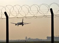 Tegel International Airport (closing in 2011), Berlin Germany (EDDT) - View through the fence at rwy 08L (by the way: the view at rwy 08R isn´t much more different;) - by Holger Zengler