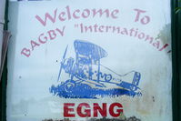 EGNG Airport - in the window of the clubhouse at Bagby airfield - by Chris Hall