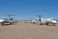 Kingman Airport (IGM) - Numerous Continental ERJs stored at Kingman - by Terry Fletcher