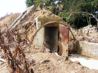 North Weald Airfield - WWII air raid shelter at the rear of one of the E pens at North Weald Airfield - by Chris Hall