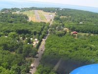 Put In Bay Airport (3W2) - Turning final for 21 - by Bob Simmermon