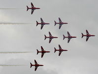 Kemble Airport, Kemble, England United Kingdom (EGBP) - Red Arrows in Eagle formation - by Chris Hall