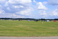 Turweston Aerodrome Airport, Turweston, England United Kingdom (EGBT) - Sixty helicopters at Turweston used for ferrying race fans to Silverstone for the British F1 Grand Prix - by Chris Hall