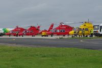 Norwich International Airport, Norwich, England United Kingdom (EGSH) - A line up of Bond and NHL helicopters. - by Graham Reeve