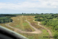 Quoin Hill Airport - On short finals. Airfield now largely disused - by Peter Lewis