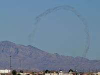 North Las Vegas Airport (VGT) - Smoke trails left from aircraft practicing for Aviation Nation 2006. Seen from about 10 miles away. - by Brad Campbell