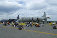 Misawa Air Base / Misawa Airport - P-3C Orion from Kadena AB Japan on display at Misawa AB airshow along side a Yokota AB C-130 - by Eagar