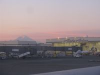 Seattle-tacoma International Airport (SEA) - The Alaska Airlines hangar at 6:30 AM at KSEA. - by Kreg Anderson