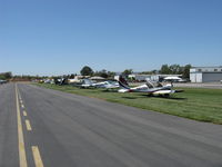 Santa Paula Airport (SZP) - James 'Seamus' McCaughley, Jr. Memorial-some of the fly-in aircraft parked on 22L grass - by Doug Robertson