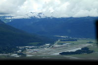 Juneau International Airport (JNU) - joining for downwind Juneau Alaska in Ce208 N332AK showing parallel hard and not so hard runways - by Pete Hughes