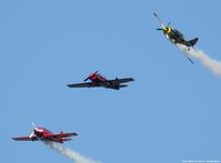 Easton/newnam Field Airport (ESN) - Yak-52s breaking over Easton MD - by J.G. Handelman