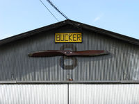 Santa Paula Airport (SZP) - Pat Quinn's Aviation Museum of Santa Paula Bucker Hangar-closeup  - by Doug Robertson