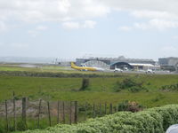 Auckland International Airport, Auckland New Zealand (NZAA) - View of cargo and biz jet apron from one of the viewing areas just to the east of the airport on the road to Manukau.

Good place for photos if landing towards the west. - by magnaman