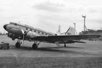 London Heathrow Airport, London, England United Kingdom (EGLL) - An unidentified BEA Douglas C-47 Royal Mail aircraft at Heathrow Airport, London in 1955. In the background on the right is the Queens Building, the roof of which was a favourite spectator location. - by Harry Longden