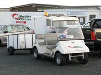 Swansea Airport, Swansea, Wales United Kingdom (EGFH) - Skydive Swansea's buggy and trailer used for transport from the landing areas to manifest. - by Roger Winser