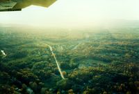 Dutchess County Airport (POU) - Turning Right Base for Runway 24 over Red Oaks Mill at Dutchess County Airport, Poughkeepsie, NY - 1986  - by scotch-canadian