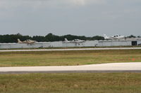 Lakeland Linder Regional Airport (LAL) - Sun N Fun traffic at Lakeland, 3 SR 22s take off for demos - by Florida Metal