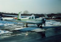 Dutchess County Airport (POU) - Mooney Aircraft parked at Dutchess County Airport, Poughkeepsie, NY - circa 1980's - by scotch-canadian