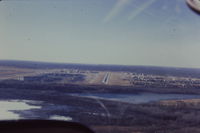 Minneapolis-st Paul Intl/wold-chamberlain Airport (MSP) - One mile final to rwy 29R. Taken from N84891. - by GatewayN727