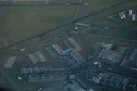 Amsterdam Schiphol Airport, Haarlemmermeer, near Amsterdam Netherlands (EHAM) - Amsterdam airport, Schiphol, seen from a KLM 777-300 while overflying. Lots of KLM aircraft and the tower are to be seen. - by Henk van Capelle