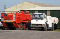 Swansea Airport, Swansea, Wales United Kingdom (EGFH) - Scammel Fire and Rescue tender FIRE 1 and recently arrived Leyland Jet A-1 fuel tanker. - by Roger Winser