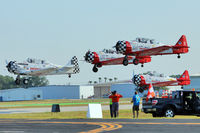 Lakeland Linder Regional Airport (LAL) - Aeroshell Display Team at 2012 Sun N Fun - by Terry Fletcher