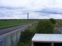 X4SR Airport - southern taxi way looking east at RNAS Stretton - by Chris Hall