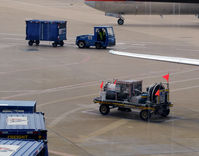 Dallas/fort Worth International Airport (DFW) - Fuel pump and baggage train - by Ronald Barker