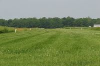 Miller Farm Landing Strip Airport (7B4) - Looking west down the grass runway - by Kevin Kuhn