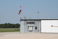 Decorah Municipal Airport (DEH) - South corner of the FBO office - by Glenn E. Chatfield