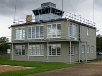 Duxford Airport, Cambridge, England United Kingdom (EGSU) - Duxford tower built in 1941, the rooftop observation post was added later by the 78th Fighter Group - by Chris Hall