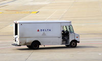 Hartsfield - Jackson Atlanta International Airport (ATL) - Truck on flight line - by Ronald Barker