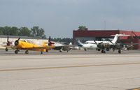 Willow Run Airport (YIP) - ramp overview P-38, T-6, 2 P-47s and a couple DC-9s at Thunder Over Michigan - by Florida Metal