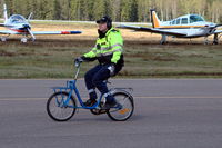 Växjö Airport (Kronoberg Airport) - This is the follow-me bicyclist of the 5 may 2012 air show at Småland Airport, Växjö, Sweden. - by Henk van Capelle