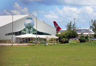 Grantley Adams International Airport - The Concorde Experience museum is located on the eastern periphery of the airport.  The irony in this photograph is that Sir Richard Branson wanted to buy a British Airways Concorde and continue to offer supersonic air transport. - by Daniel L. Berek