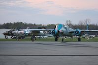 Grimes Field Airport (I74) - B-25's starting up at dawn for the flight to Dayton. - by Bob Simmermon