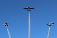 Old Buckenham Airport, Norwich, England United Kingdom (EGSV) - G-EDGJ leading G-ZIII and G-PITZ over Old Buckenham with smoke on. - by Graham Reeve