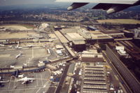 London Gatwick Airport, London, England United Kingdom (EGKK) - Scanned from original slide taken in early September 1991.  The view is of the then Terminal buildings (later to be South Terminal) and rail station, taken from departing NorthWest Airlines flight to MSP. - by Neil Henry