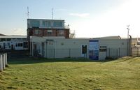 Swansea Airport, Swansea, Wales United Kingdom (EGFH) - Control Tower and Cambrian Fying Club HQ at Swansea Airport. Autumn sunshine 2012. - by Roger Winser