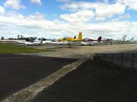 North Shore Aerodrome Airport, Auckland New Zealand (NZNE) - Flying club apron - by magnaman