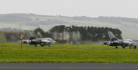 RAF Leuchars Airport, Leuchars, Scotland United Kingdom (EGQL) - A Pair of AG-51 Tornado IDS ,46+22 & 44+78,roar down runway 27 on an afternoon Joint warrior sortie - by Mike stanners