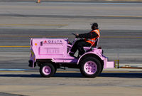 Ronald Reagan Washington National Airport (DCA) - Pink Delta Tug  For the cure - by Ronald Barker