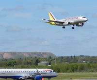 Edinburgh Airport, Edinburgh, Scotland United Kingdom (EGPH) - Germanwings A319-132 D-AGWM comes in to Land from CGN While EMB190-100SR G-LCYJ Waits to enter runway 06 for departure to LCY - by Mike stanners