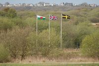 Swansea Airport, Swansea, Wales United Kingdom (EGFH) - Flags at the entrance to Swansea Airport. May 2013. - by Roger Winser