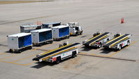 City Of Colorado Springs Municipal Airport (COS) - Equipment on the ramp  COS - by Ronald Barker